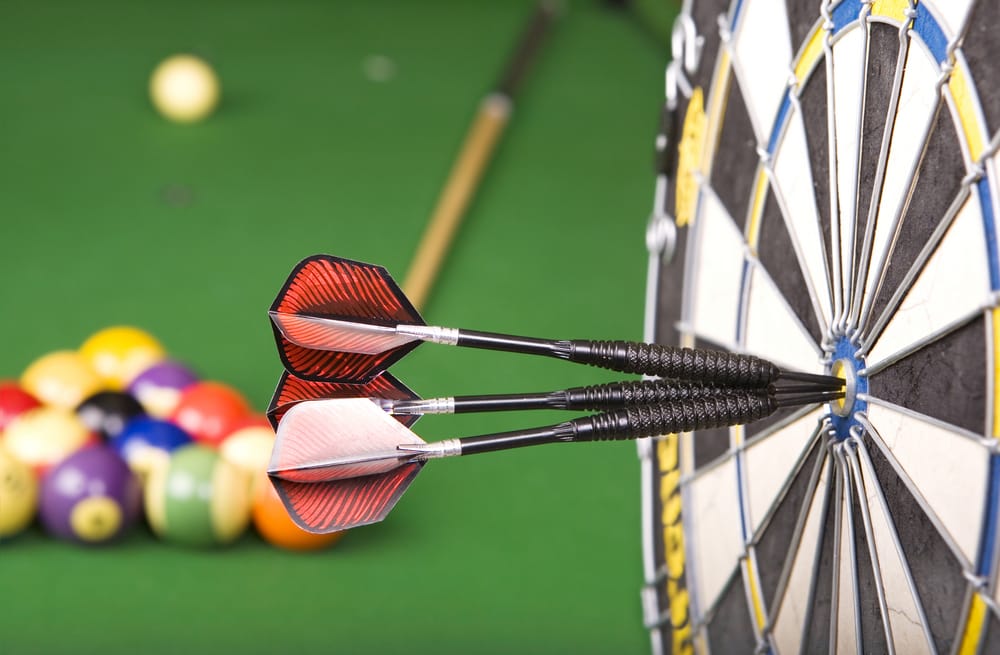 Picture of darts board and pool table