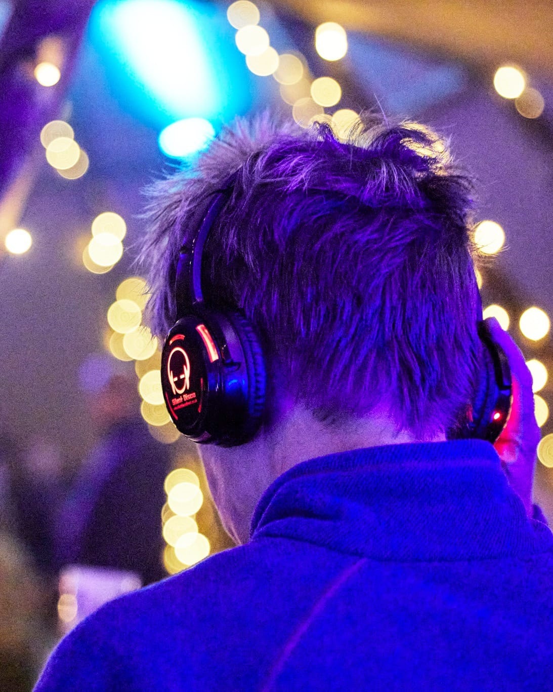 Picture man wearing silent disco headset