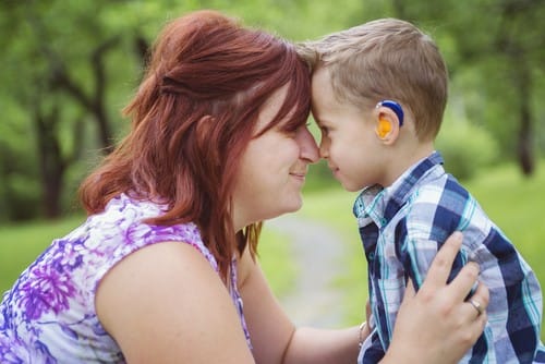 boy with hearing aid