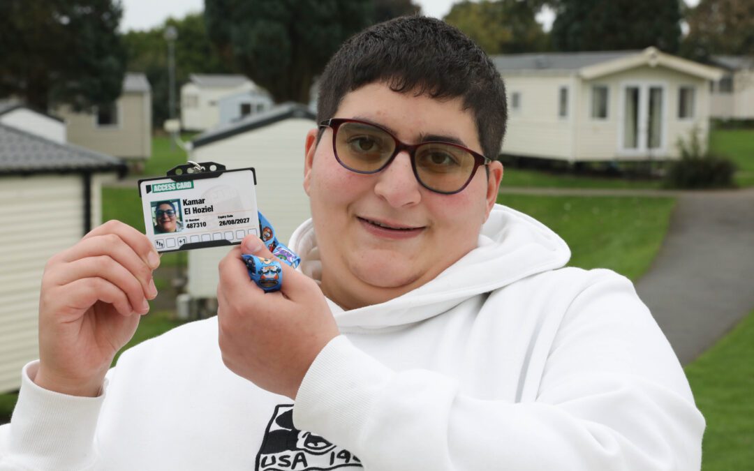 Picture of Kamar holding the Access Card at Hafan y Mor, Pwllheli